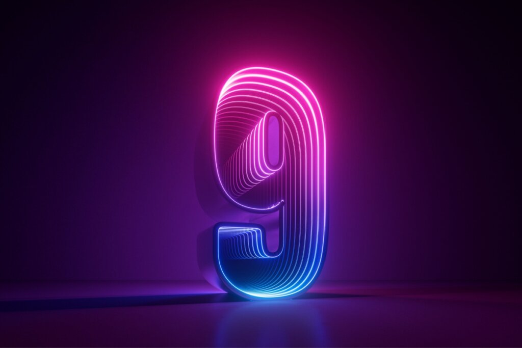 Veja como usar a numerologia para escolher o dia do seu casamento 47 Ilustração do número nove em rosa e azul em um fundo preto