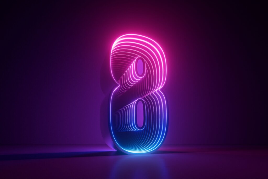 Veja como usar a numerologia para escolher o dia do seu casamento 46 Ilustração do número oito em rosa e azul em um fundo preto