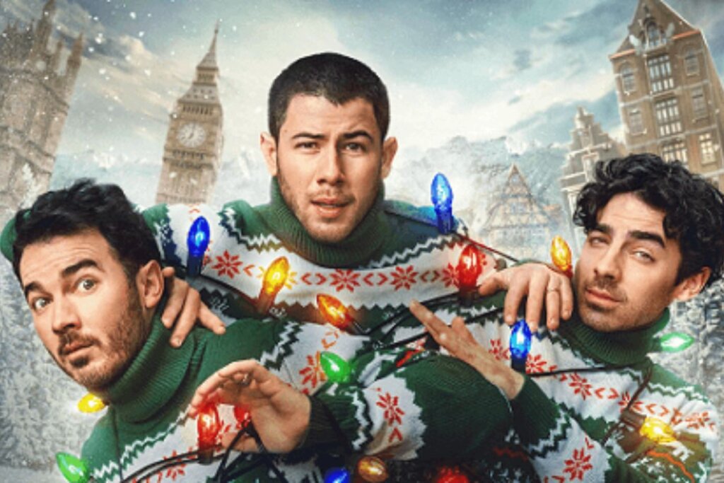 Capa do filme "Um Natal Bem Jonas Brothers", com os três irmãos usando casacos de Natal e enrolados com pisca-pisca 