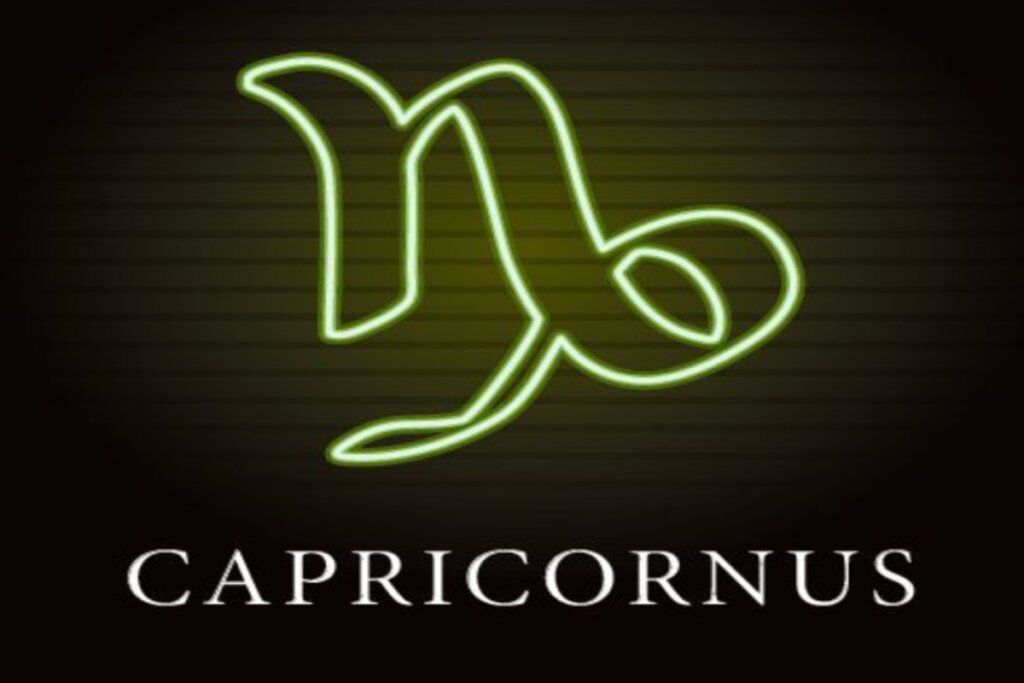 Ilustração do símbolo de capricórnio em verde néon sobre o nome do signo em inglês