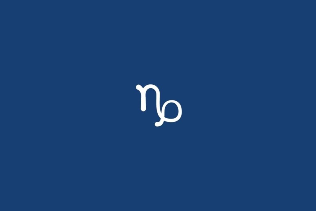 Ilustração do signo de Capricórnio, em fundo azul-escuro, contendo um traço que inicia com uma linha vertical curva e termina com um laço arredondado